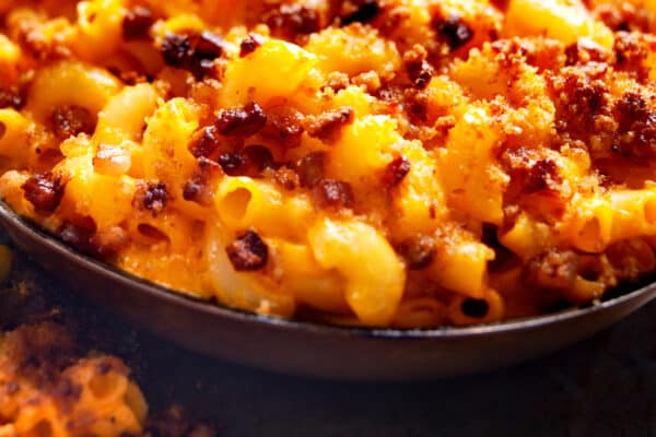 close up of rustic golden baked macaroni and cheese