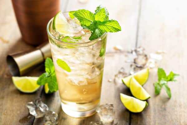 Refreshing summer cocktail with ginger beer, rum and lime